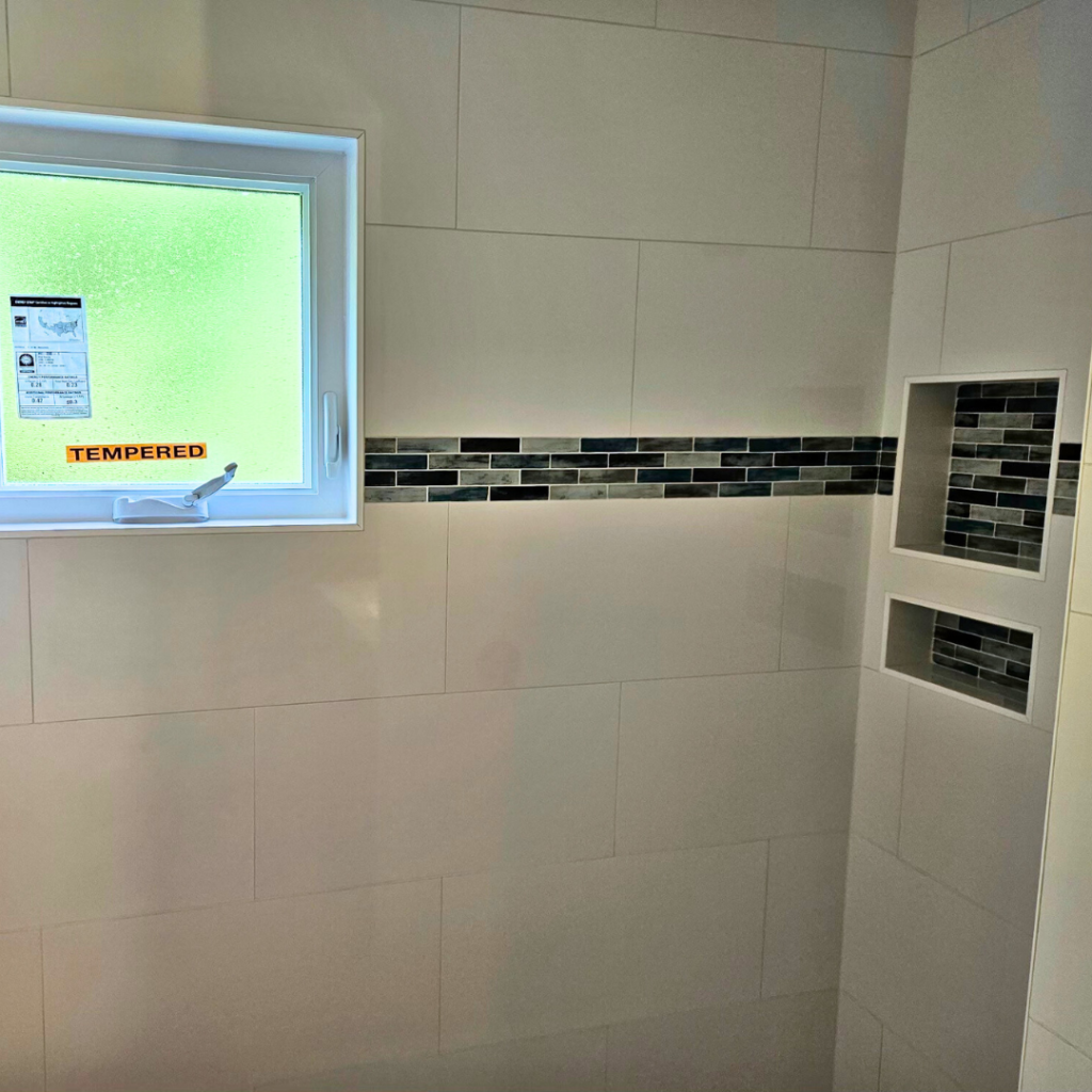 Porcelain tiles used for bathroom shower transformation. 